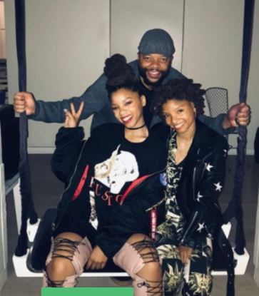 Doug Bailey with his daughters Halle Bailey and Chloe Bailey